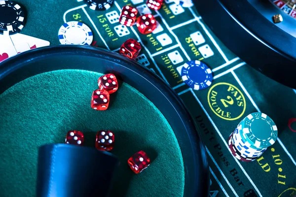 Baccarat table showing player and banker hands